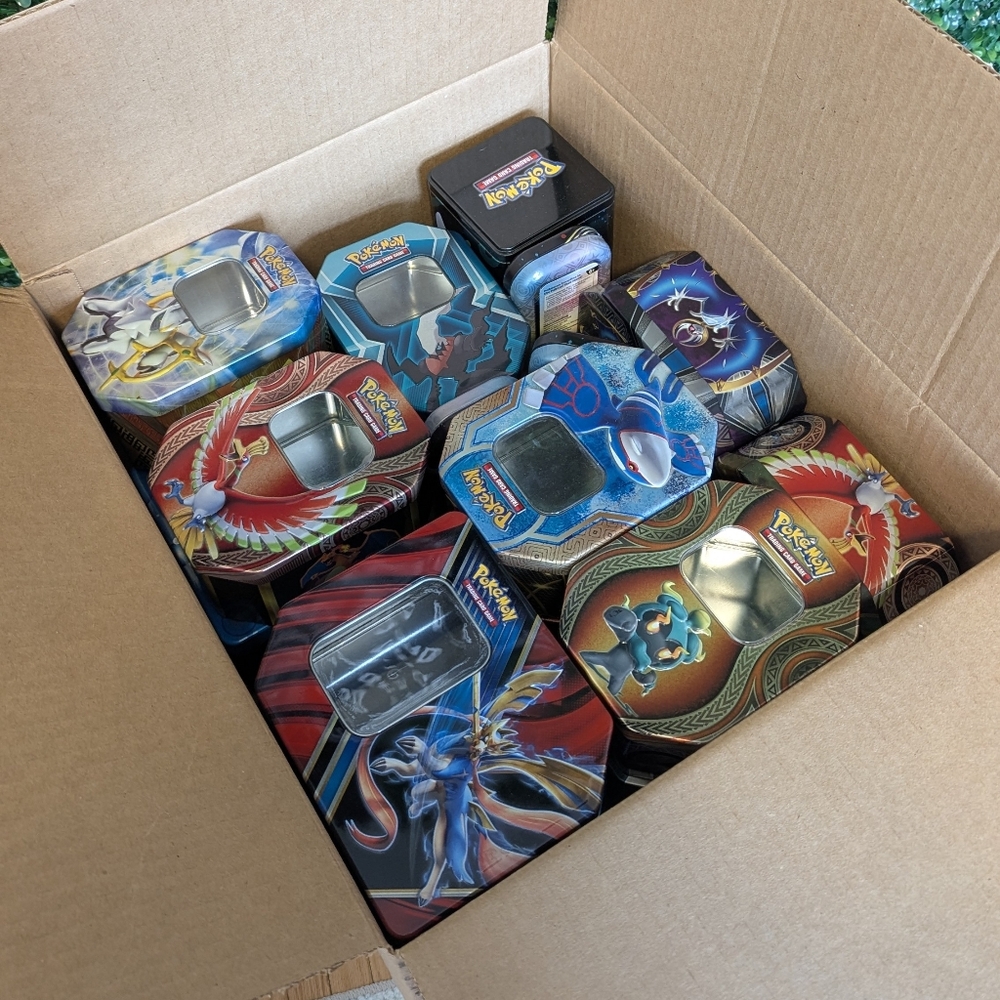 17 Assorted Pokemon Tins, no cards